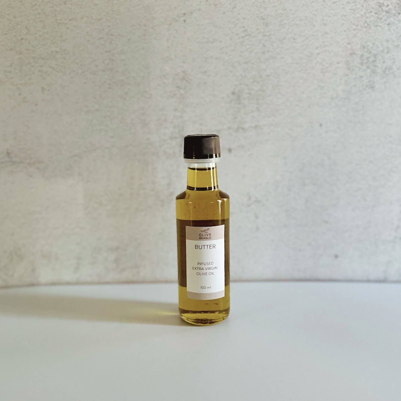 Arbequina Spanish EVOO from Olive Branch — single origin, unfiltered, first pressed, 200ml. Village Cobblery, Gualala CA.