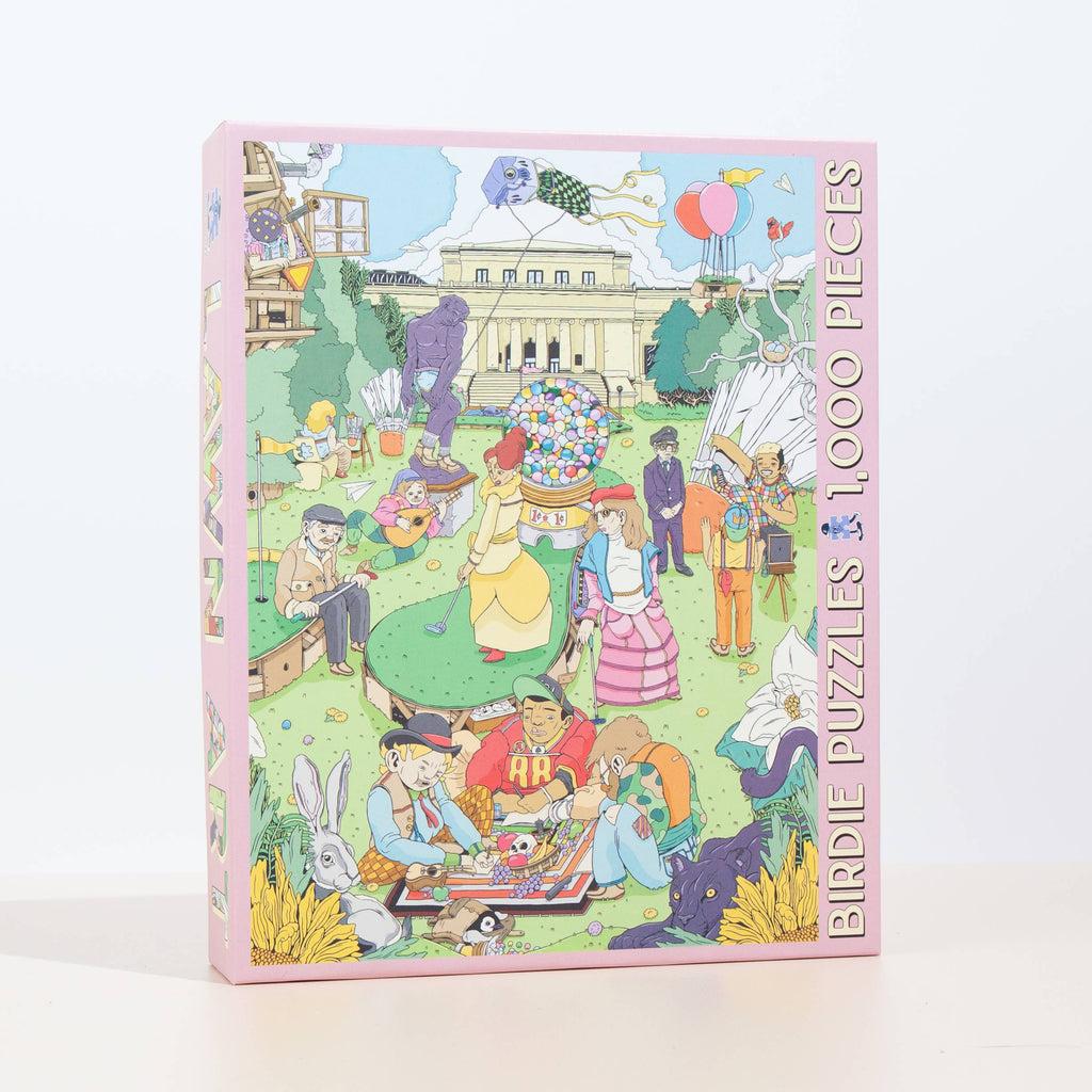 City Vibes 1000-piece puzzle by Birdie Puzzles — independent artist, made in USA, 100% recycled materials. Village Cobblery, Gualala CA.