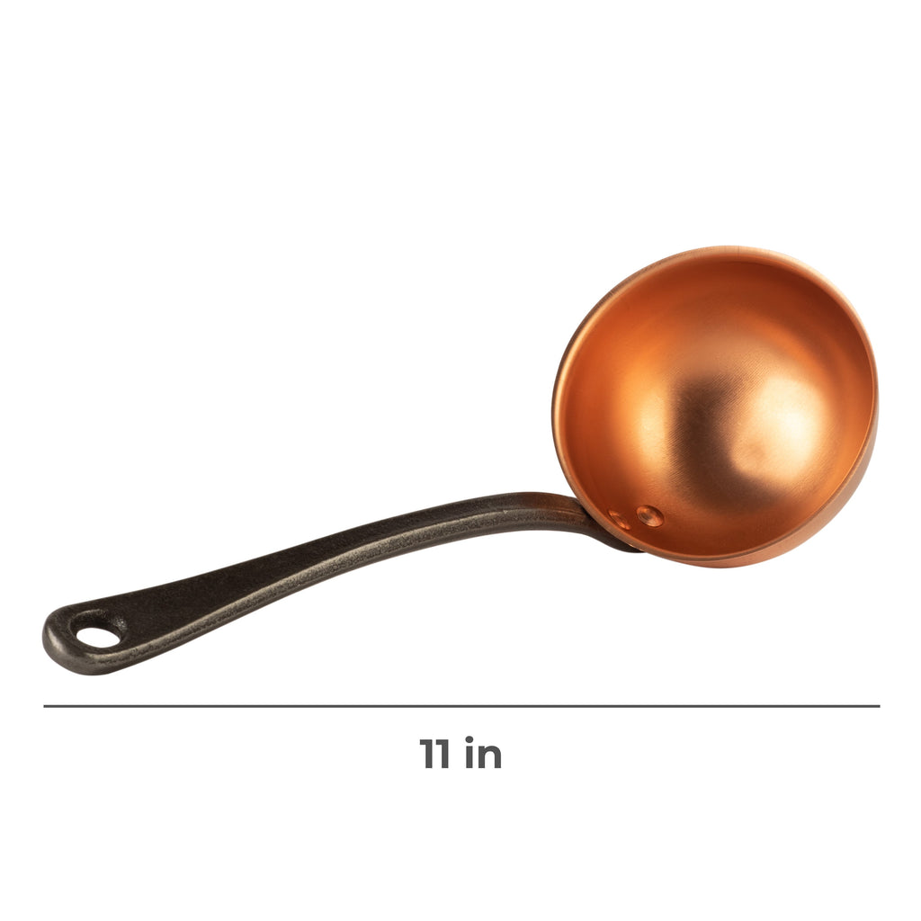 Copper ladle with cast iron handle